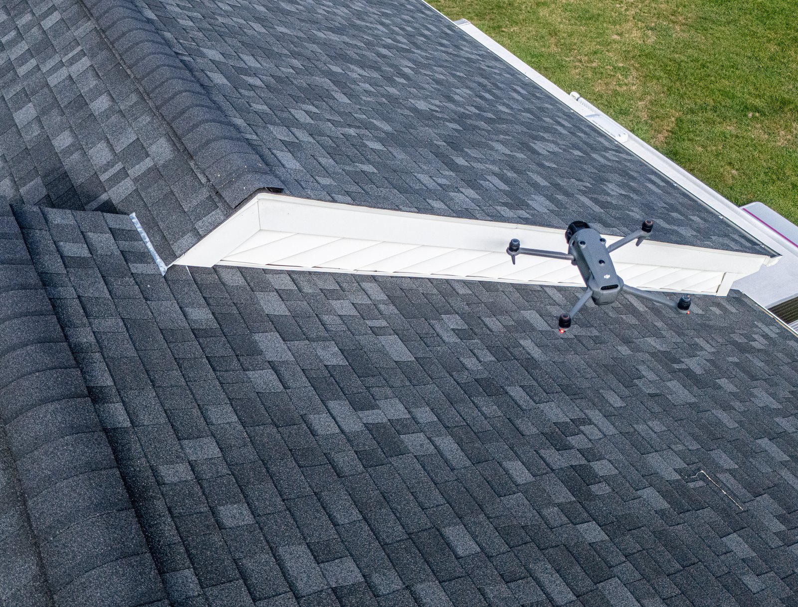 SPARVERIUS drone conducting a close aerial roof inspection in Rhode Island